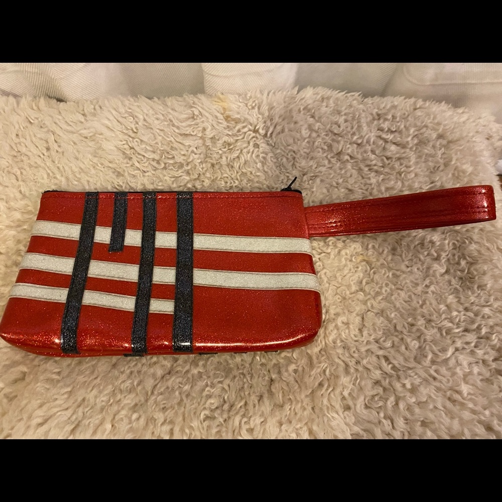 Vegan leather retro wristlet in red, black, and silver